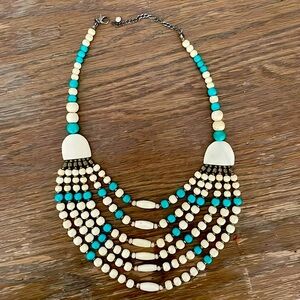 Multi layer statement necklace with turquoise and bone color beads